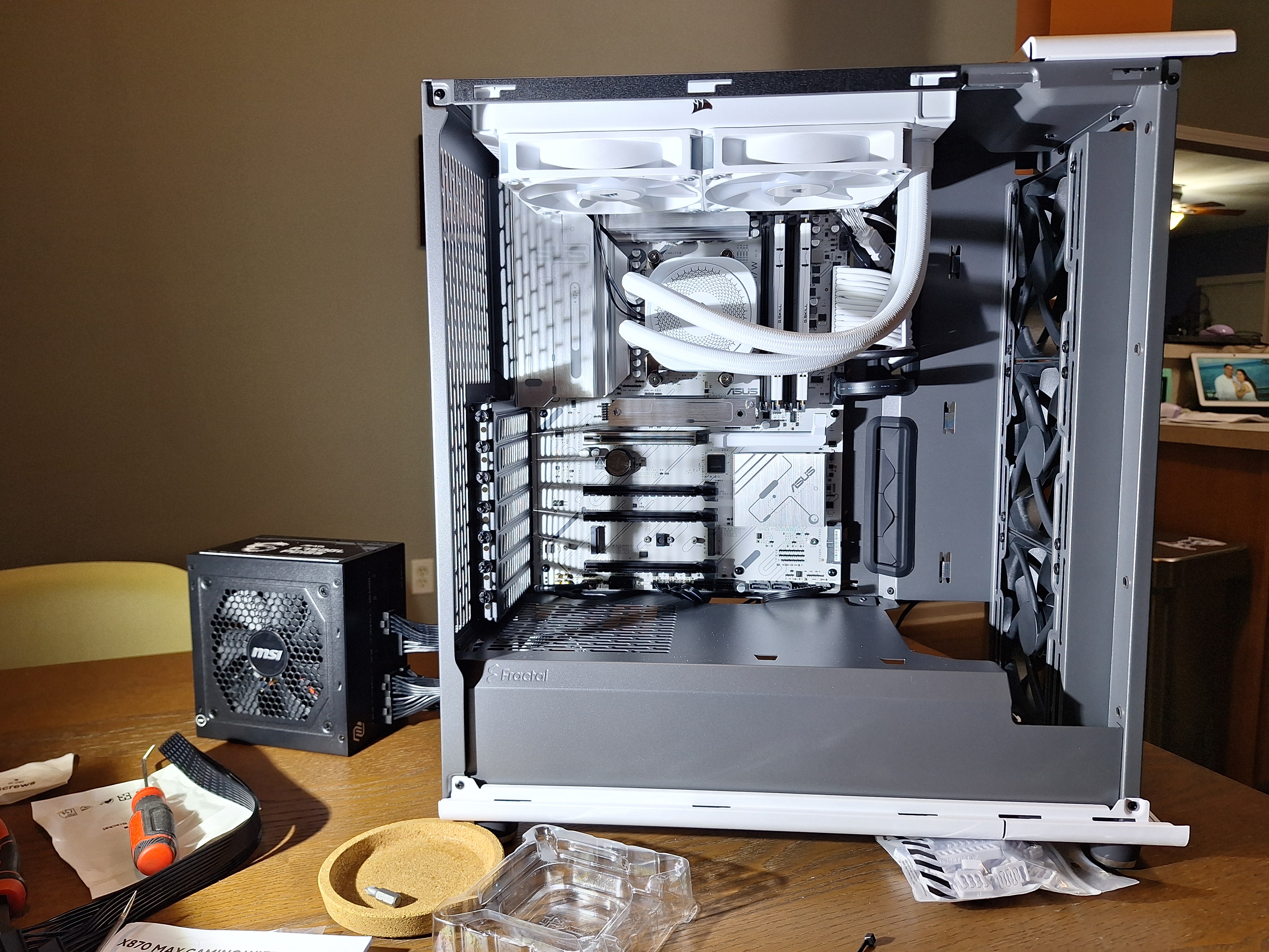 Motherboard and white liquid cooler installed in the Fractal North case